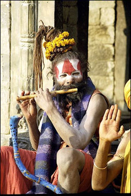 20120502-sadhu_playing_flute_Benaras.jpg