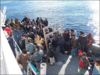 20120513-Boat_People_at_Sicily_in_the_Mediterranean_Sea.jpg