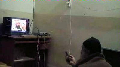 20120712-Osama_bin_Laden_watching_TV_at_his_compound_in_Pakistan-3.jpg